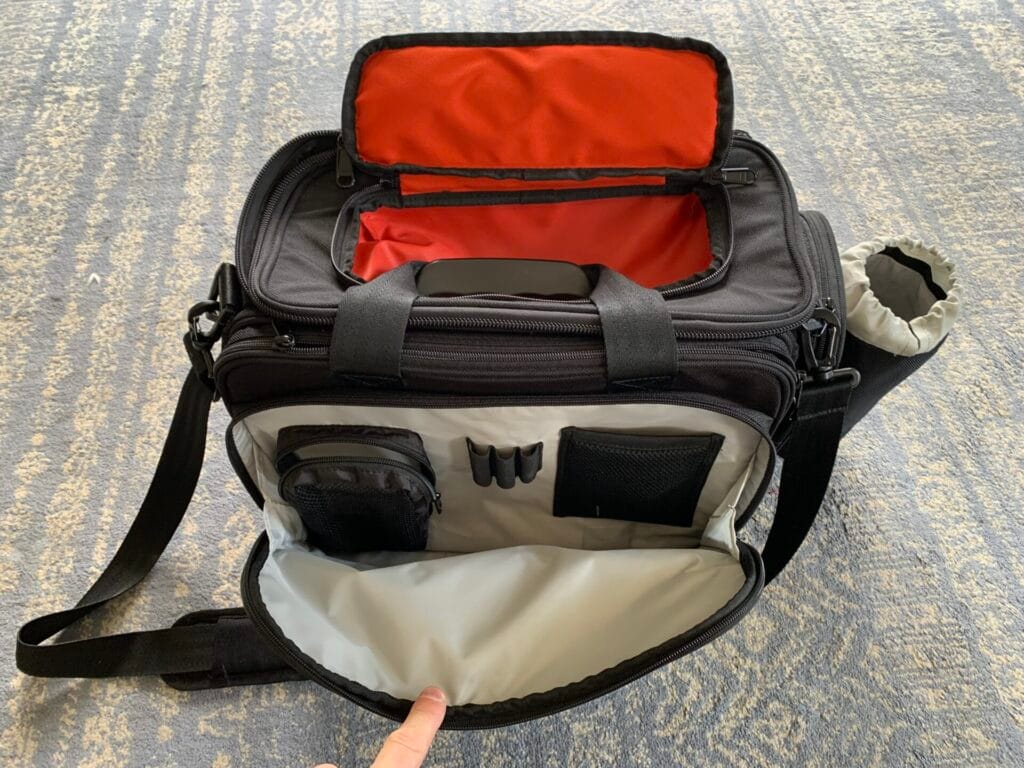 A view of the Aerocoast Pro Crew I showing the open top pocket and the second of the two front pockets with the internal organiser pockets.