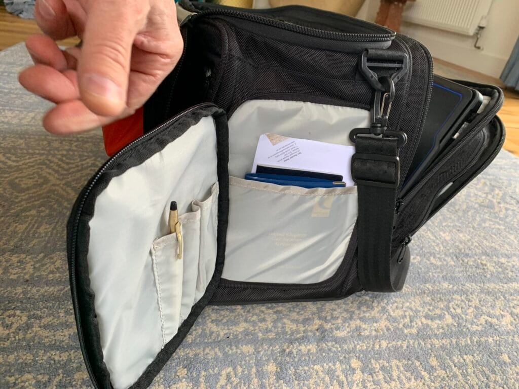 A view of the open left hand side pocket (as seen from the front) of the Aerocoast Pro Crew I. The open pocket shows the pen holders an document slip pocket inside.